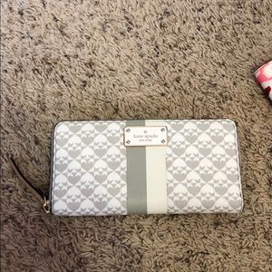 Grey and white Kate spade zip wallet